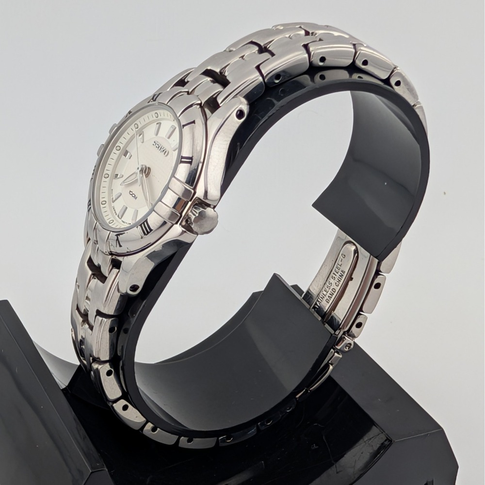 Title: Seiko 7N82-0DP0 100M Silver Textured Dial Date Watch Stainless Lume - Picture 5 of 10